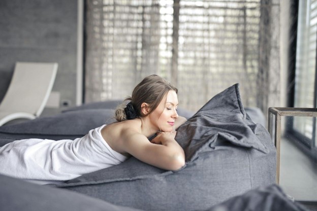 Woman lying on a bed