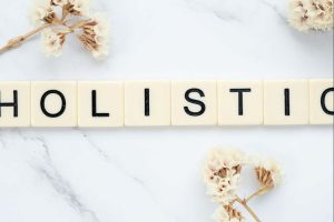 word tiles spelling holistic